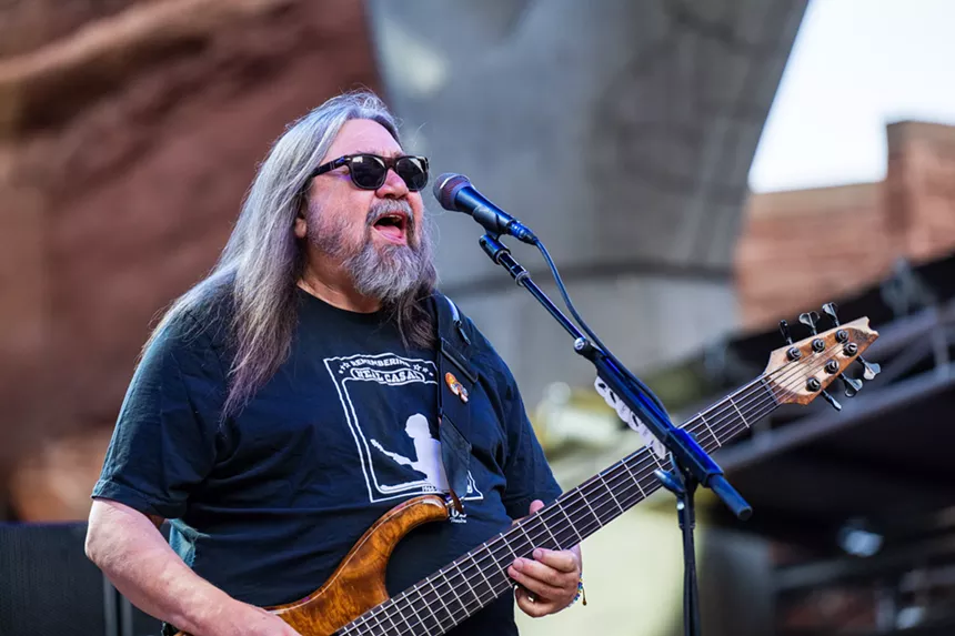 Dave Schools singing and playing bass