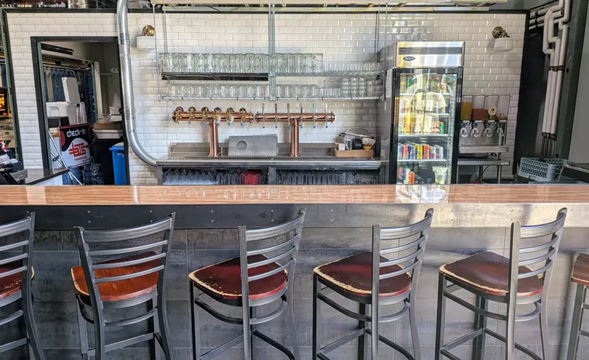 White subway tiled bar.