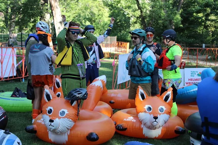 People with fox inner tubes.