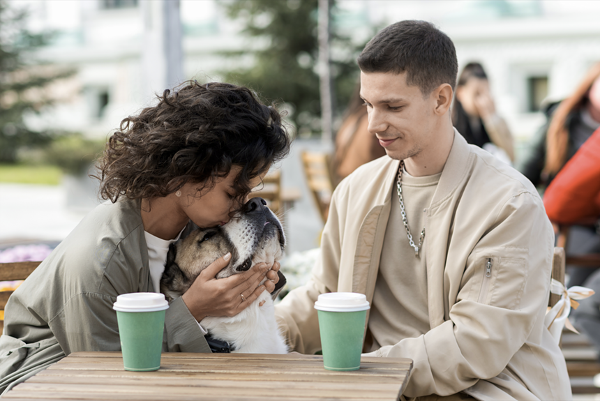 Couple with dog during coffee date