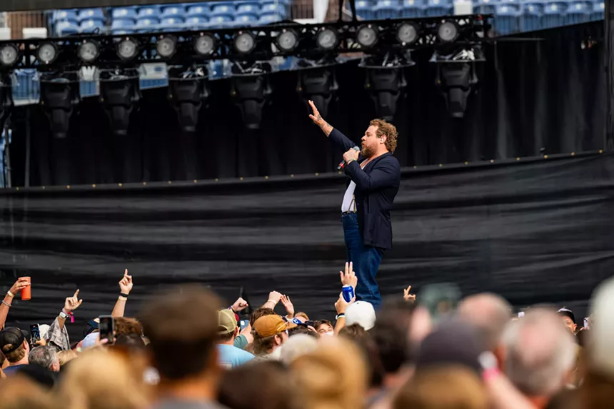 Nathaniel Rateliff on stage at Empower Field