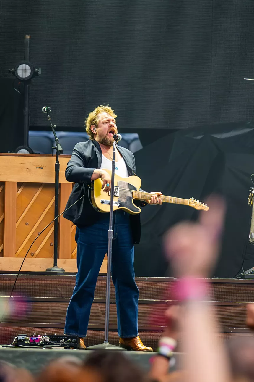 Nathaniel Rateliff on stage at Empower Field