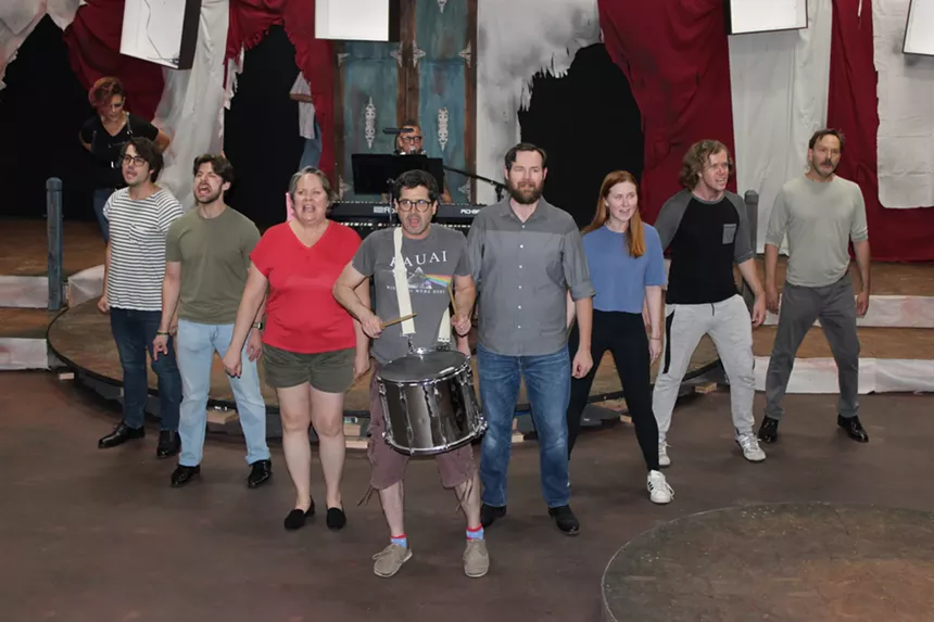 A group of actors onstage.