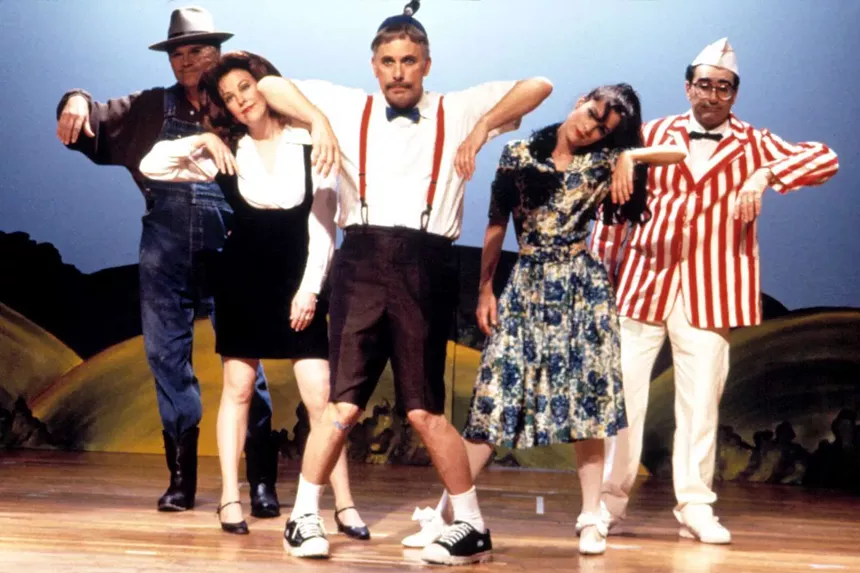 People in costume dance