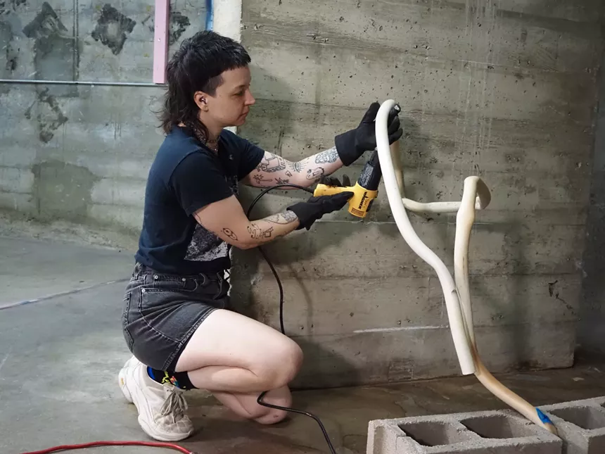A person melts tubes