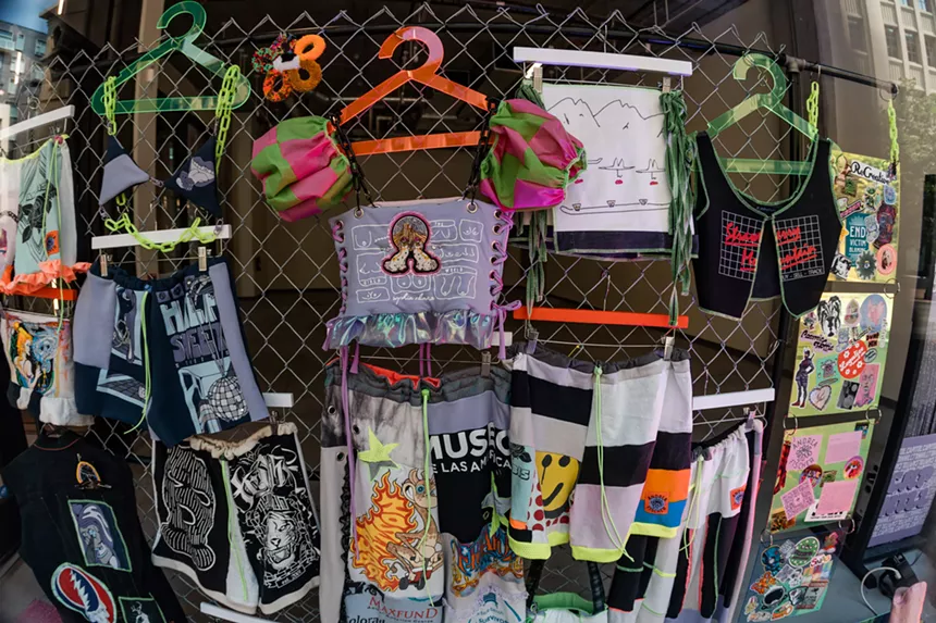 Clothes hang in a window
