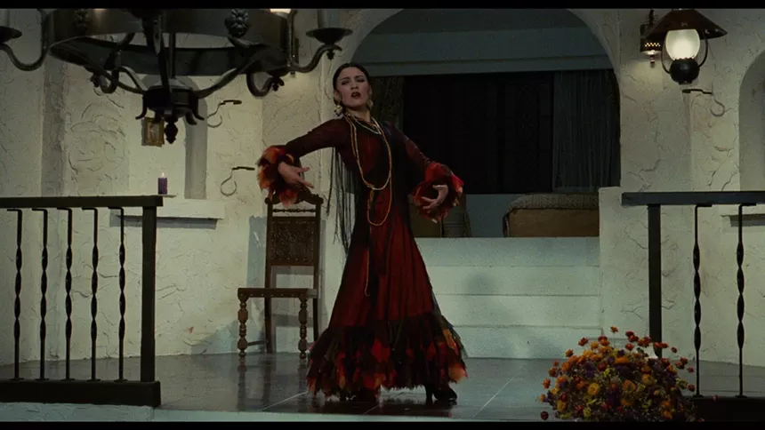 A woman in a red dress