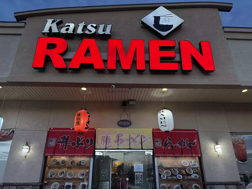 sign on outside of a restaurant