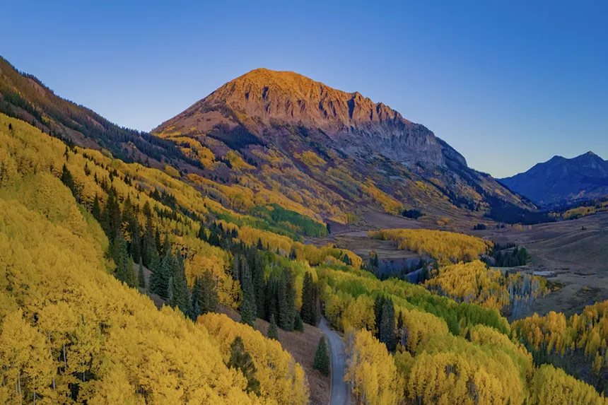 Yellow aspens and a mountain peak seen from Kenosha Pass