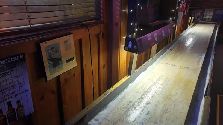 Nothing like a little shuffleboard at the Candlelight, especially if you are on an awkward date. - SARAH MCGILL