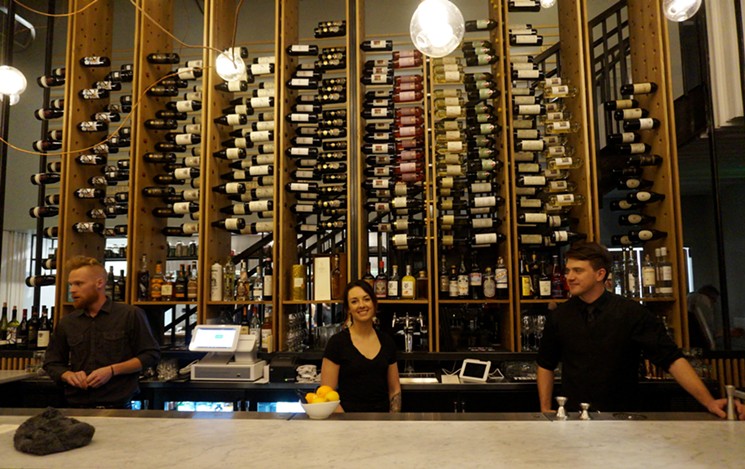 Il Posto's new bar and wine racks. - MARK ANTONATION