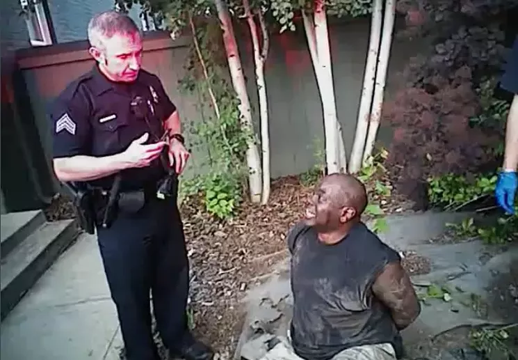Heard talking to an officer after regaining the ability to sit upright. - COURTESY OF HOLLAND, HOLLAND, EDWARDS & GROSSMAN