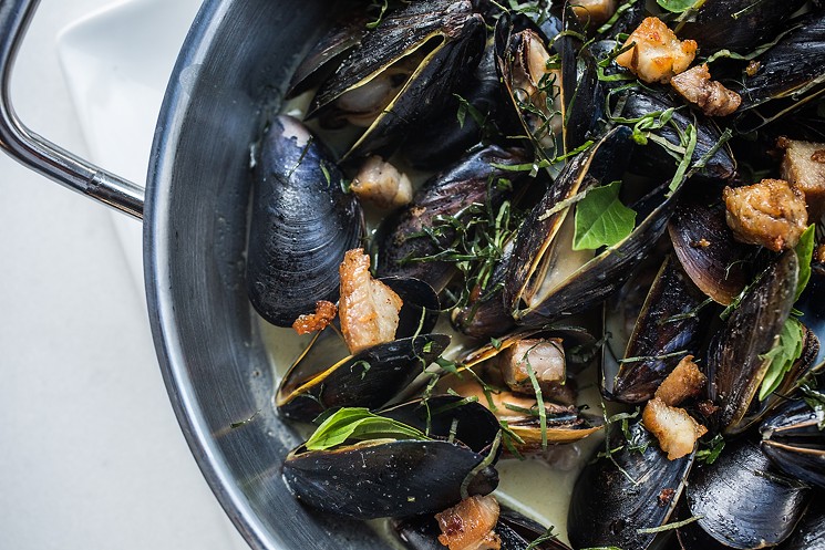 Green-curry mussels with pork lardons. - DANIELLE LIRETTE