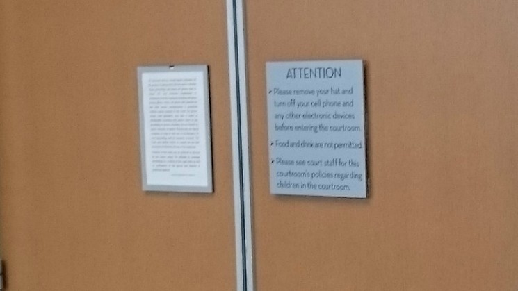 The warning sign on the doors to Courtroom 5D. - PHOTO BY MICHAEL ROBERTS