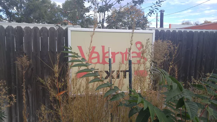A reminder of Valente's Italian Restaurant remains in the parking lot of Colorado Plus. - SARAH MCGILL