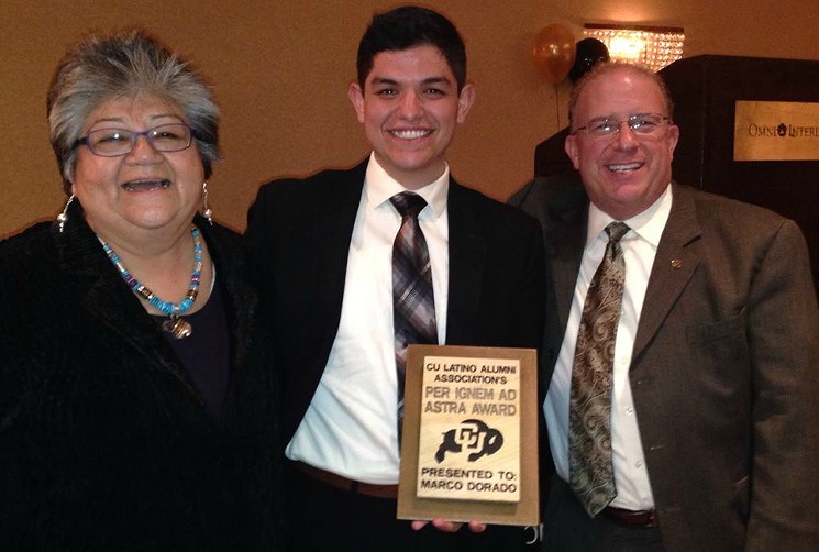 Marco Dorado, with family friends, after receiving the Per Ignem Ad Astra (From the Fire to the Stars) award from the CU Boulder Latino Alumni Association. - COURTESY OF MARCO DORADO