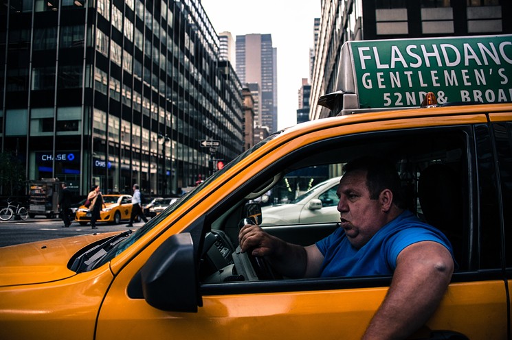 The telltale look of a seasoned cabbie. - JIM PENNUCCI/FLICKR