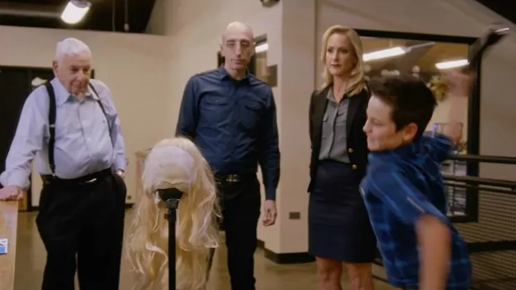 Dr. Werner Spitz, left, watches as a child is called upon to act out a theory of how Burke Ramsey could have killed his sister, JonBenét, from the CBS program The Case of: JonBenét Ramsey. - CBS