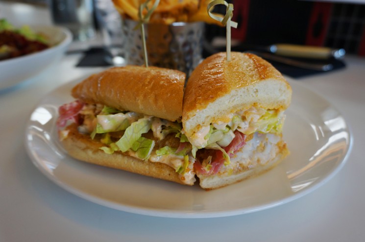 A cod sandwich on a Hinman's Bakery roll. - MARK ANTONATION