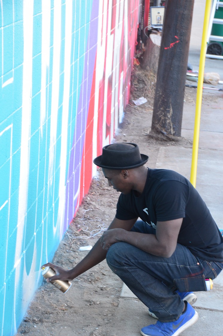 Artist Thomas Evans helped bring the BAGP mural to life. - LINDSEY BARTLETT
