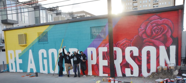 The mural in progress, from left to right: Thomas Evans, Darian Simon, Necos Jackson and Julian Donaldson. - LINDSEY BARTLETT
