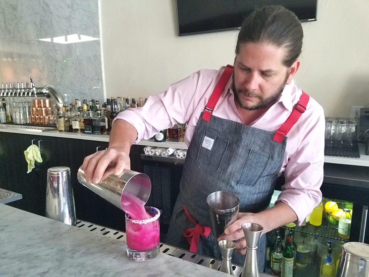 At Bar Dough, Shawn Williams shows off some of the cocktails he will be making at Señor Bear. - LINNEA COVINGTON