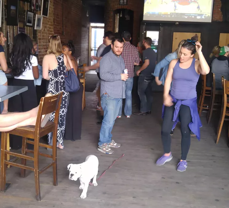 This puppy is ready to party at the Matchbox, where dogs are still allowed because the bar doesn't serve food or brew beer. - SARAH MCGILL