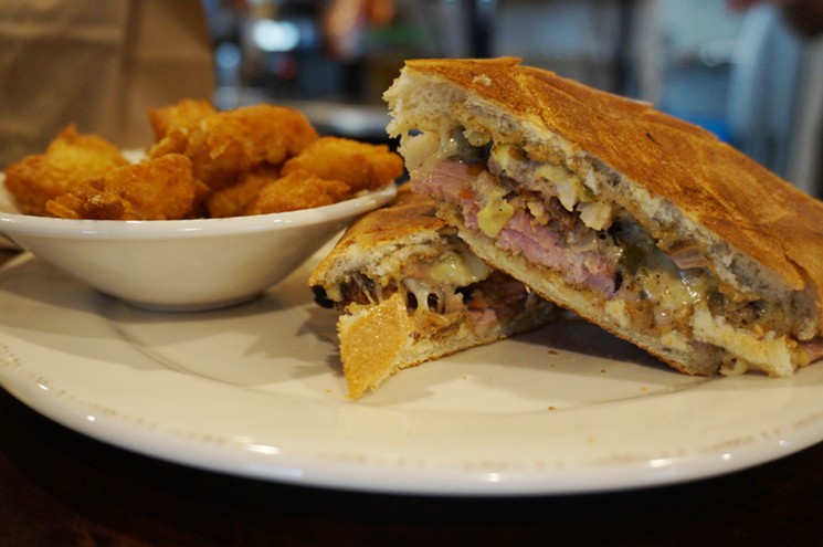 A Cubano and housemade tater tots from the lunch menu. - MARK ANTONATION