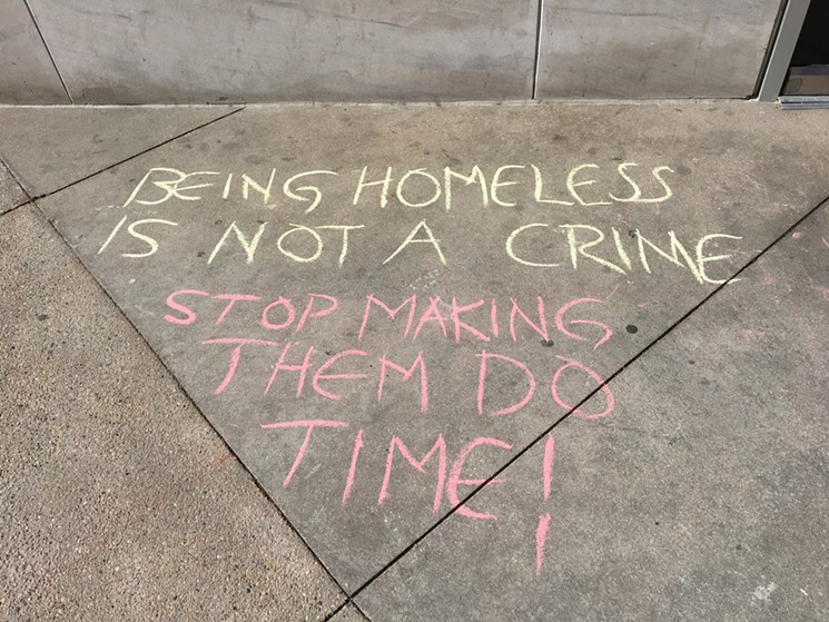 Messages scrawled outside of the Lindsey-Flanigan Courthouse on Wednesday. - CHRIS WALKER