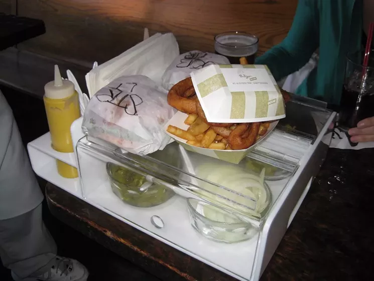 The burger and condiment caddie at My Brother's Bar is one of Denver's most familiar sights. - WESTWORD
