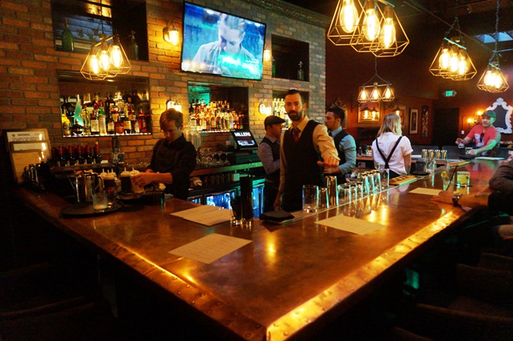 Copper and brick give the bar a lived-in feel. - MARK ANTONATION
