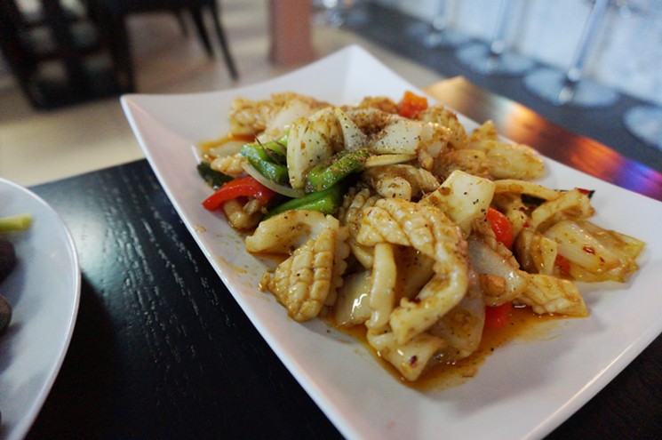 Spicy squid is a more familiar Vietnamese dish. - MARK ANTONATION