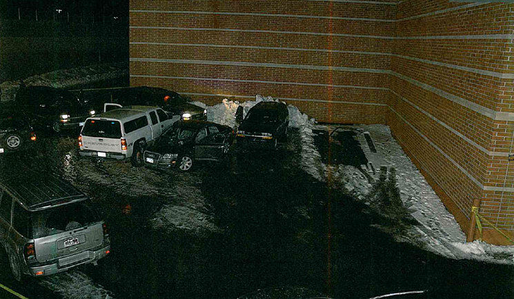 A photo taken after the shooting: Havens was behind the wheel of the Audi, its right front wheel pinned to the Chevy K2500. - FILE PHOTO