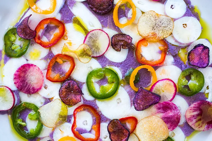 Il Posto's octopus carpaccio is a work of modern art as well as a lovely appetizer. - DANIELLE LIRETTE