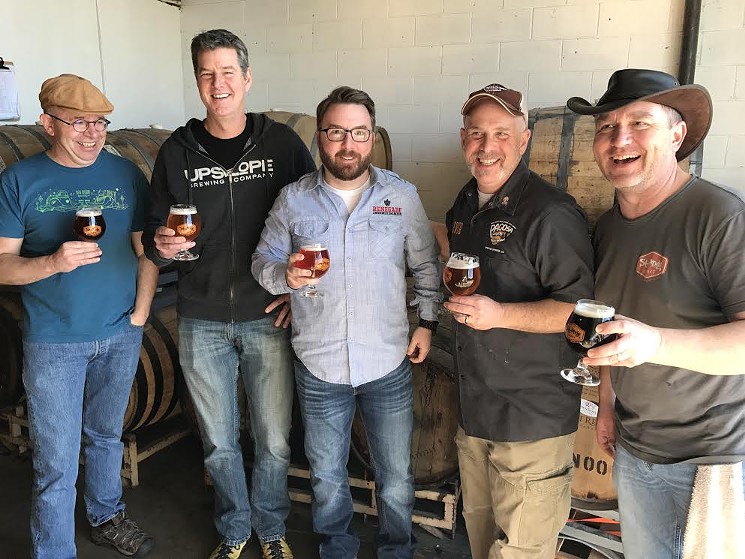 Peter Bouckaert (left) collaborated with members of the Colorado Brewers Guild last March on a beer that was served at Collaboration Fest. - JONATHAN SHIKES