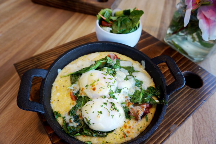 Three-cheese polenta topped with 140-degree eggs makes for a hearty breakfast or comforting dinner at Olive & Finch. - MARK ANTONATION