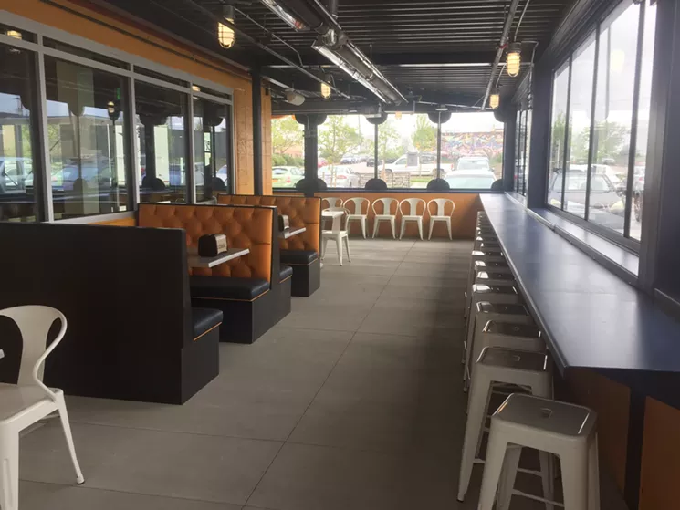 The new Rosenberg's sports a wraparound patio that's built for all kinds of Colorado weather. - VERONICA PENNEY