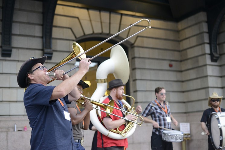 Buskers perform outside Union Station. - SCOTT LENTZ