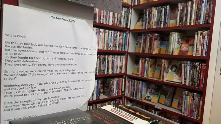 A poem by a longtime customer greets patrons as they enter the store's vast LGBTQ section. - KEITH GARCIA