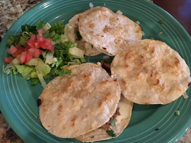 Corn-tortilla quesadillas called suegras (or mothers-in-law) at Villagran. - MARK ANTONATION