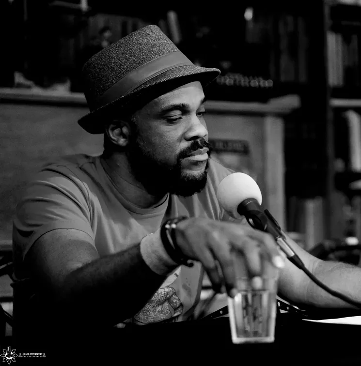 R. Alan Brooks at the mic. - JOHN FORQUER/THE KHAOS EXPERIMENT PHOTOGRAPHY