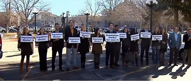 Pro-marijuana industry protesters made their presence felt at a 2015 hearing for the Safe Streets Alliance lawsuit. - CBS4 FILE PHOTO