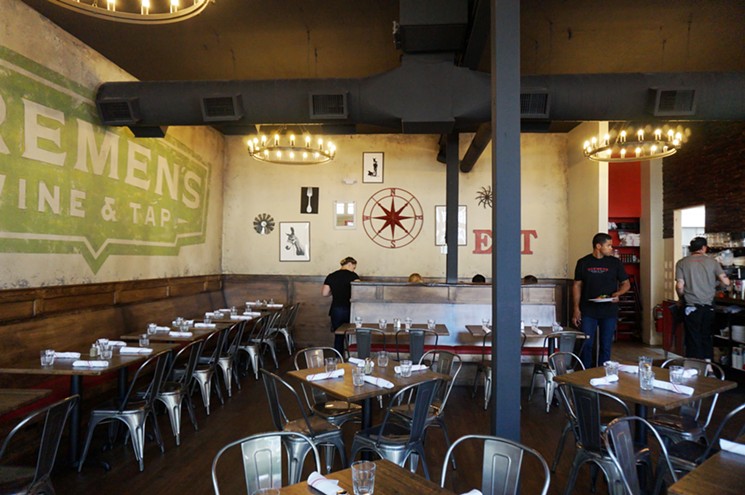 Bremen's dining room includes a semi-private eight-seat booth in the back. - MARK ANTONATION
