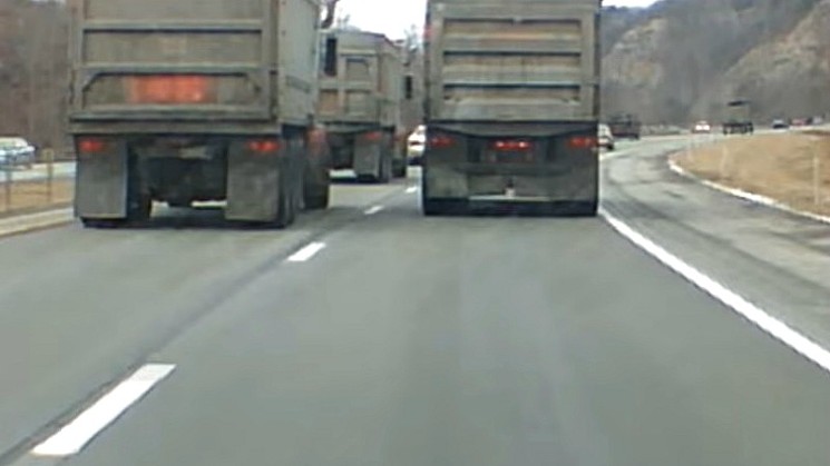 Trucks try to pass other trucks — and everyone else pays. - YOUTUBE