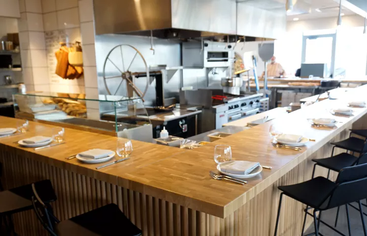 The chef's counter at Cattivella is the place to dine. Each of the three sides offers a view of different kitchen action. This is also where you'll sit if you sign up for a cooking class from chef/owner Elise Wiggins. - MARK ANTONATION