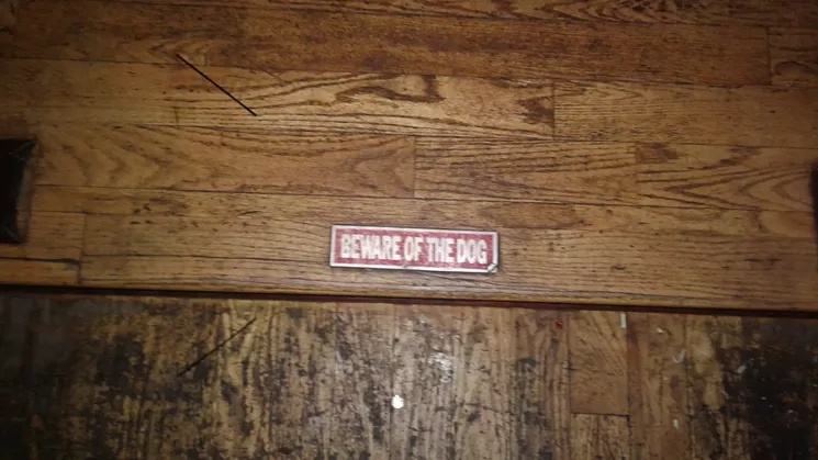 When there's no "Watch Your Step" sign available, "Beware of the Dog" is the next best thing. - SARAH MCGILL