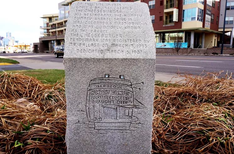 The cheeseburger shrine at 2776 Speer Boulevard is now part of the landscaping at a Key Bank branch. - MARK ANTONATION
