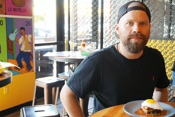 Chef Jesse Vega inside the updated space that doesn't stray too far from the decor at the former Central Bistro. - MARK ANTONATION
