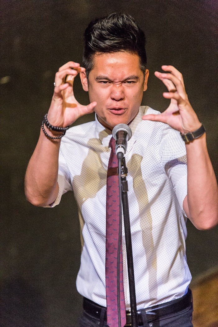A slam poet performs at the 2015 National Poetry Slam in Oakland. - ADAM RUBINSTEIN