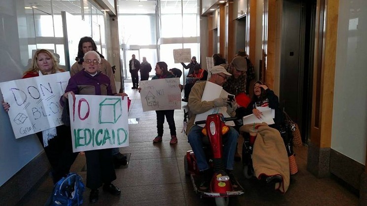 Disability-rights protesters who were cited for trespassing during a demonstration in January. - PHOTO COURTESY OF JEFF HART